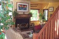 Relax in Front of the Woodstove in the Inviting Living Room